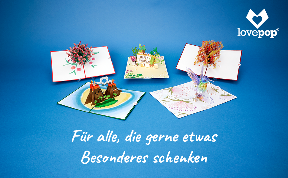 Fünf offene Pop-up-Grußkarten mit verschiedenen 3D-Designs, darunter Blumen, Gebäude und Tiere, vor blauem Hintergrund. Text in Deutsch weist darauf hin, dass sie zum besonderen Verschenken bestimmt